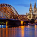 night view of Cologne Cathedral and Hohenzollern Bridge, Cologne, Germany